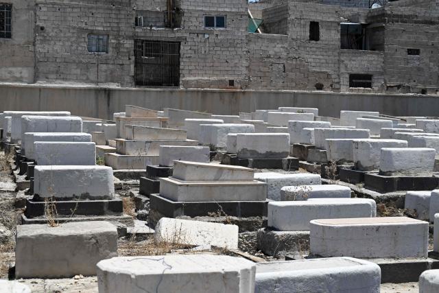 This picture shows a view of the Jewish cemetery in Damascus on June 30, 2026. After the new government took power in Syria, Syrian Jews began visiting their country and cleaning their old cemeteries. (Photo by LOUAI BESHARA / AFP)