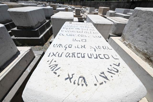 This picture shows a view of the Jewish cemetery in Damascus on June 30, 2026. After the new government took power in Syria, Syrian Jews began visiting their country and cleaning their old cemeteries. (Photo by LOUAI BESHARA / AFP)