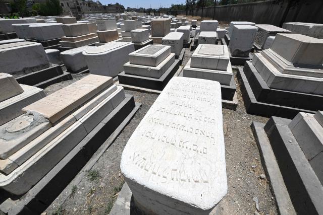 This picture shows a view of the Jewish cemetery in Damascus on June 30, 2026. After the new government took power in Syria, Syrian Jews began visiting their country and cleaning their old cemeteries. (Photo by LOUAI BESHARA / AFP)