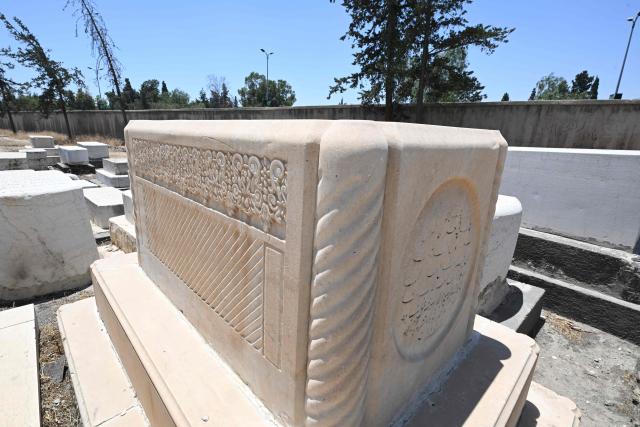 This picture shows a view of the Jewish cemetery in Damascus on June 30, 2026. After the new government took power in Syria, Syrian Jews began visiting their country and cleaning their old cemeteries. (Photo by LOUAI BESHARA / AFP)
