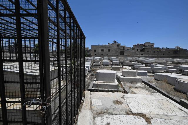 This picture shows a view of the Jewish cemetery in Damascus on June 30, 2026. After the new government took power in Syria, Syrian Jews began visiting their country and cleaning their old cemeteries. (Photo by LOUAI BESHARA / AFP)
