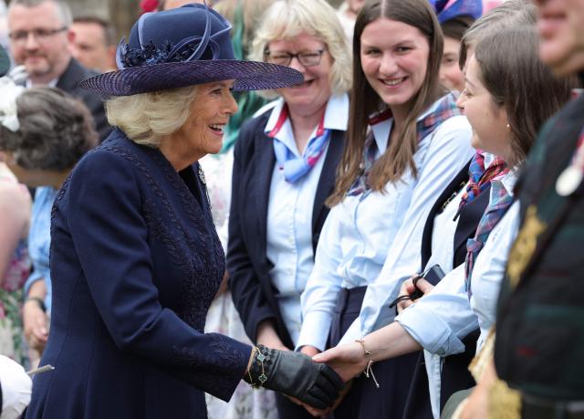 Britain's Queen Camilla attends during a Garden Party in the gardens of Palace of Holyroodhouse in Edinburgh, in Scotland on June 30, 2026. (Photo by Steve Welsh / POOL / AFP)