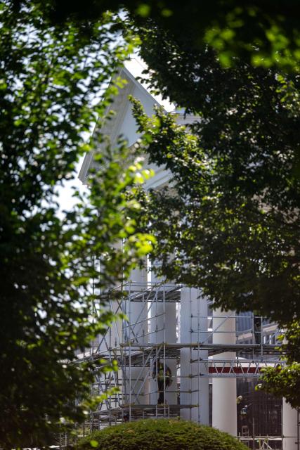 Workers build scaffolding around the columns of the North Portico of the White House in Washington, DC, on June 30, 2026. (Photo by Kent Nishimura / AFP)