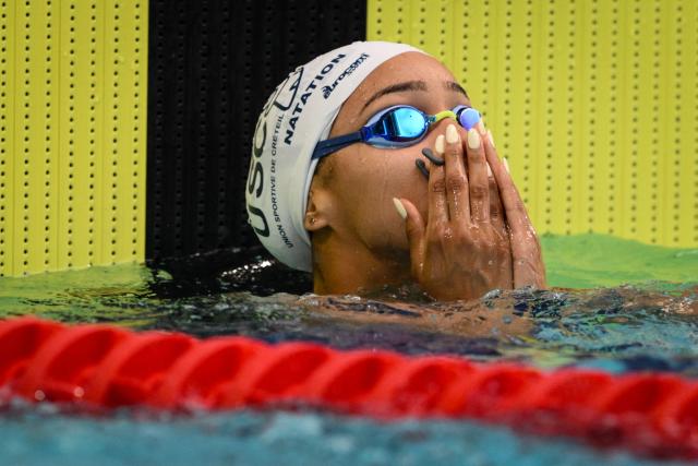 French swimmer Mary-Ambre Moluh reacts in the women's 100m backstroke final during the French national swimming championships in Saint-Etienne on June 30, 2026. (Photo by OLIVIER CHASSIGNOLE / AFP)