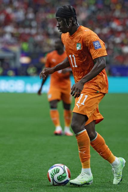 Ivory Coast's forward #11 Yan Diomande runs with the ball during the 2026 World Cup round of 32 football match between Ivory Coast and Norway at the Dallas Stadium in Arlington on June 30, 2026.  (Photo by Aric Becker / AFP)