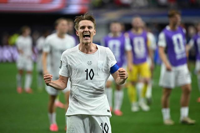 Norway's midfielder #10 Martin Odegaard celebrates after winning the 2026 World Cup round of 32 football match between Ivory Coast and Norway at the Dallas Stadium in Arlington on June 30, 2026.  (Photo by Paul ELLIS / AFP)