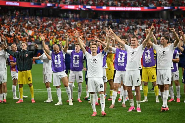 Norway's players celebrate after winning the 2026 World Cup round of 32 football match between Ivory Coast and Norway at the Dallas Stadium in Arlington on June 30, 2026.  (Photo by Paul ELLIS / AFP)