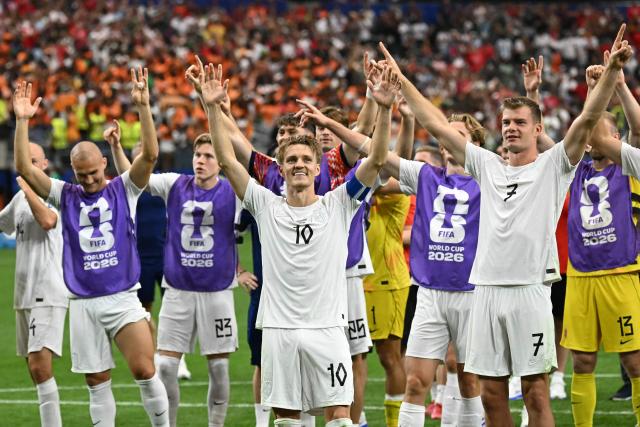 Norway's players celebrate after winning the 2026 World Cup round of 32 football match between Ivory Coast and Norway at the Dallas Stadium in Arlington on June 30, 2026.  (Photo by Paul ELLIS / AFP)
