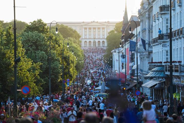 Norway fans cheer after the victory in 2026 World Cup round of 32 football match between Ivory Coast and Norway after watching the match at Kongens gate in Oslo on June 30, 2026. (Photo by Javad Parsa / NTB / AFP) / Norway OUT