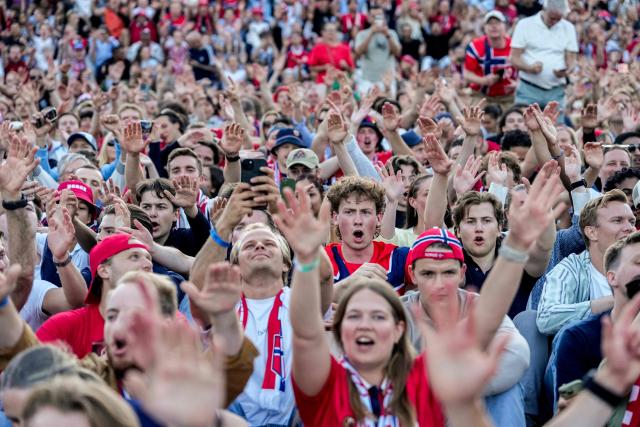 Norway fans cheer after the victory in 2026 World Cup round of 32 football match between Ivory Coast and Norway after watching the match at Kongens gate in Oslo on June 30, 2026. (Photo by Javad Parsa / NTB / AFP) / Norway OUT