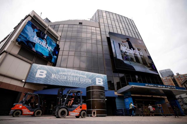 Forklifts are seen outside Madison Square Garden in New York on June 30, 2026. Increasing signs point to a mega-bash for the A-list celebrity couple Taylor Swift and Travis Kelce at Madison Square Garden this week. Rumors have run rampant for weeks that the 36-year-old pop superstar and the three-time NFL Super Bowl winner, both 36, could wed at the storied sports arena, home to the New York Knicks, the newly crowned NBA champions. (Photo by Leonardo MUNOZ / AFP)