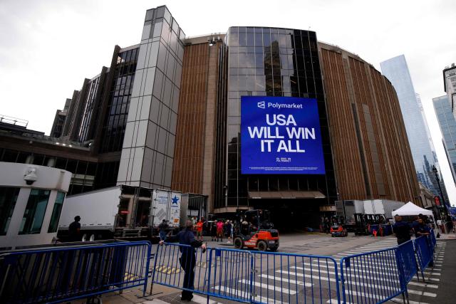 Forklifts and trucks are seen outside Madison Square Garden in New York on June 30, 2026. Increasing signs point to a mega-bash for the A-list celebrity couple Taylor Swift and Travis Kelce at Madison Square Garden this week. Rumors have run rampant for weeks that the 36-year-old pop superstar and the three-time NFL Super Bowl winner, both 36, could wed at the storied sports arena, home to the New York Knicks, the newly crowned NBA champions. (Photo by Leonardo MUNOZ / AFP)