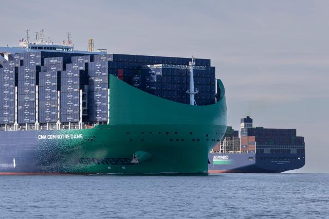 The CMA-CGM container ship the "Notre Dame", France's largest container ship, sails past the CMA-CGM Jacques Saade container ship as it approaches the northern port of Le Havre on June 29, 2026. With 400 meters long, 62 meters wide, and 75 meters high, the CMA CGM Notre-Dame is designed to carry up to 24,212 containers. (Photo by Alain JOCARD / AFP)