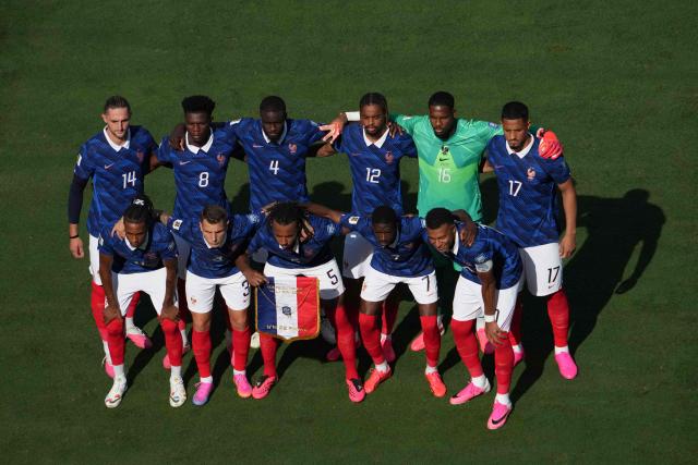 France's players pose for a team photo ahead of the 2026 World Cup round of 32 football match between France and Sweden at the New York/New Jersey Stadium in East Rutherford on June 30, 2026.  (Photo by TIMOTHY A. CLARY / AFP)