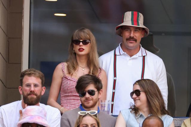 (FILES) US singer-songwriter Taylor Swift (L) and US NFL football player Travis Kelce (R) attend the men's final match between Italy's Jannik Sinner and USA's Taylor Fritz on day fourteen of the US Open tennis tournament at the USTA Billie Jean King National Tennis Center in New York City, on September 8, 2024. Increasing signs point to a mega-bash for the A-list celebrity couple Taylor Swift and Travis Kelce at Madison Square Garden this week. Rumors have run rampant for weeks that the 36-year-old pop superstar and the three-time NFL Super Bowl winner, both 36, could wed at the storied sports arena, home to the New York Knicks, the newly crowned NBA champions. (Photo by CHARLY TRIBALLEAU / AFP)