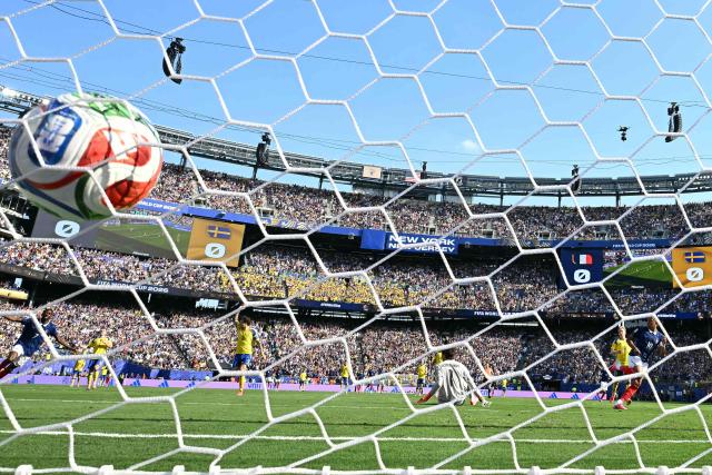 France's forward #10 Kylian Mbappe scores a goal disallowed for offside past Sweden's goalkeeper #01 Jacob Widell Zetterstrom during the 2026 World Cup round of 32 football match between France and Sweden at the New York/New Jersey Stadium in East Rutherford on June 30, 2026.  (Photo by Jewel SAMAD / AFP)