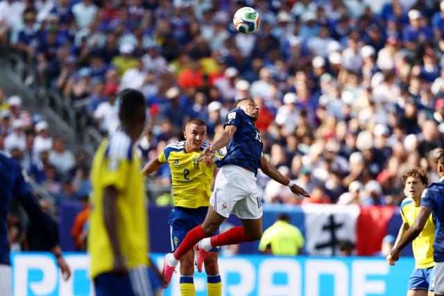 Sweden's defender #02 Gustaf Lagerbielke and France's forward #10 Kylian Mbappe fight for the ball during the 2026 World Cup round of 32 football match between France and Sweden at the New York/New Jersey Stadium in East Rutherford on June 30, 2026.  (Photo by CHARLY TRIBALLEAU / AFP)