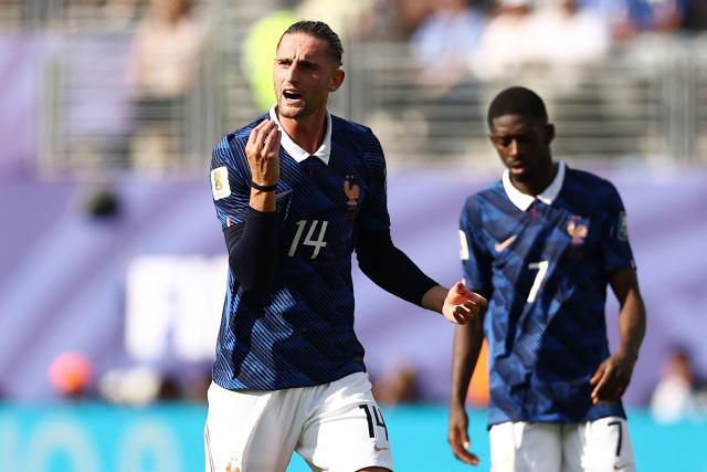 France's midfielder #14 Adrien Rabiot reacts during the 2026 World Cup round of 32 football match between France and Sweden at the New York/New Jersey Stadium in East Rutherford on June 30, 2026.  (Photo by CHARLY TRIBALLEAU / AFP)