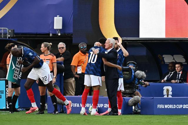 France's forward #10 Kylian Mbappe hugshead coach Didier Deschamps as he leaves the pitch after being substituted during the 2026 World Cup round of 32 football match between France and Sweden at the New York/New Jersey Stadium in East Rutherford on June 30, 2026.  (Photo by Jewel SAMAD / AFP)