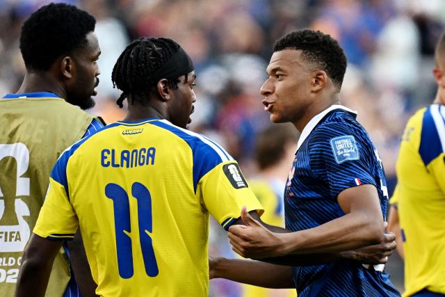 Sweden's forward #11 Anthony Elanga and France's forward #10 Kylian Mbappe talk after the 2026 World Cup round of 32 football match between France and Sweden at the New York/New Jersey Stadium in East Rutherford on June 30, 2026.  (Photo by Jewel SAMAD / AFP)