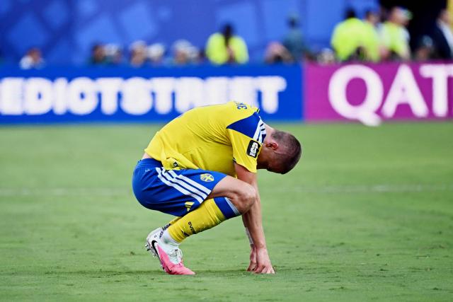 Sweden's defender #02 Gustaf Lagerbielke reacts after losing the 2026 World Cup round of 32 football match between France and Sweden at the New York/New Jersey Stadium in East Rutherford on June 30, 2026.  (Photo by Jewel SAMAD / AFP)