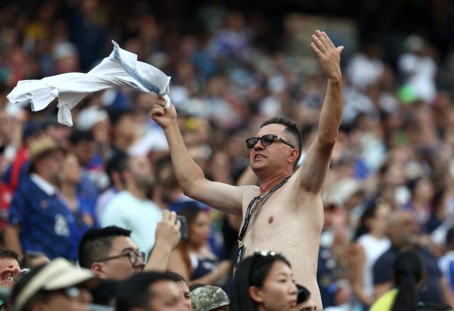 A fan of France cheer during the 2026 World Cup round of 32 football match between France and Sweden at the New York/New Jersey Stadium in East Rutherford on June 30, 2026.  (Photo by FRANCK FIFE / AFP)