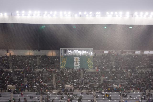 Rain falls at the Mexico City Stadium ahead of the 2026 World Cup round of 32 football match between Mexico and Ecuador in Mexico City on June 30, 2026.  (Photo by Rodrigo Oropeza / AFP)