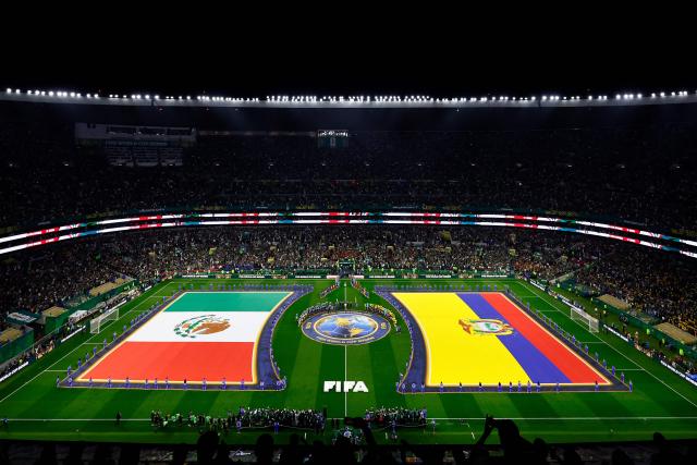 Players sing their national anthems ahead of the 2026 World Cup round of 32 football match between Mexico and Ecuador at the Mexico City Stadium in Mexico City on June 30, 2026.  (Photo by Rodrigo Oropeza / AFP)