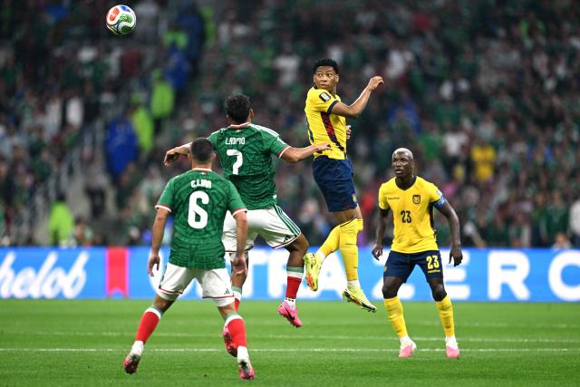 Mexico's midfielder #07 Luis Romo and Ecuador's midfielder #19 Gonzalo Plata fight for the ball during the 2026 World Cup round of 32 football match between Mexico and Ecuador at the Mexico City Stadium in Mexico City on June 30, 2026.  (Photo by CARL DE SOUZA / AFP)