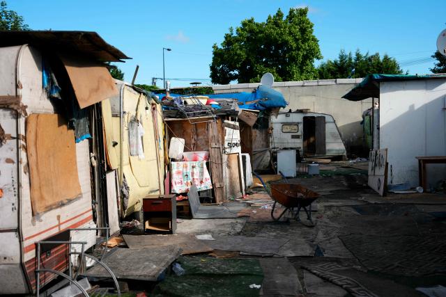 This photograph shows makeshift homes after the evacuation and clearance operation of the Stains' shantytown, North of Paris, on July 1, 2026. (Photo by Dimitar DILKOFF / AFP)