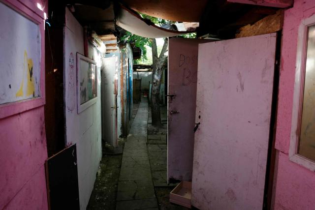 This photograph shows an empty corridor after the evacuation and clearance operation of the Stains' shantytown, North of Paris, on July 1, 2026. (Photo by Dimitar DILKOFF / AFP)