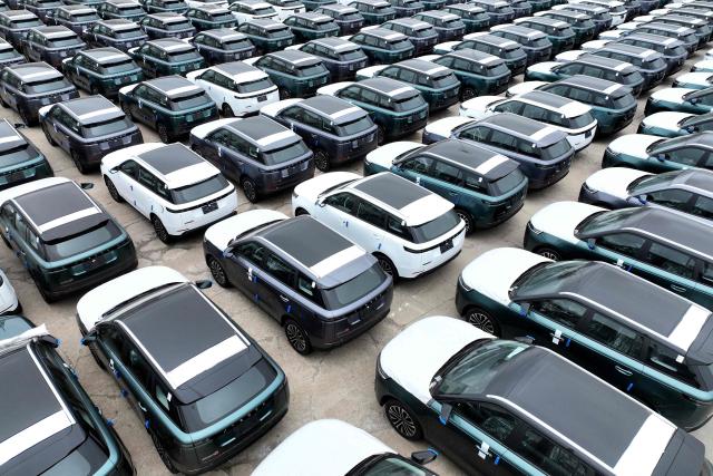Jaecoo SUVs of Chinese automaker Chery are seen at the Dongfang port branch of Lianyungang Port in Jiangsu province, eastern China on July 1, 2026, ready to be loaded onto ships for export. (Photo by -STR / CN-STR / AFP) / China OUT