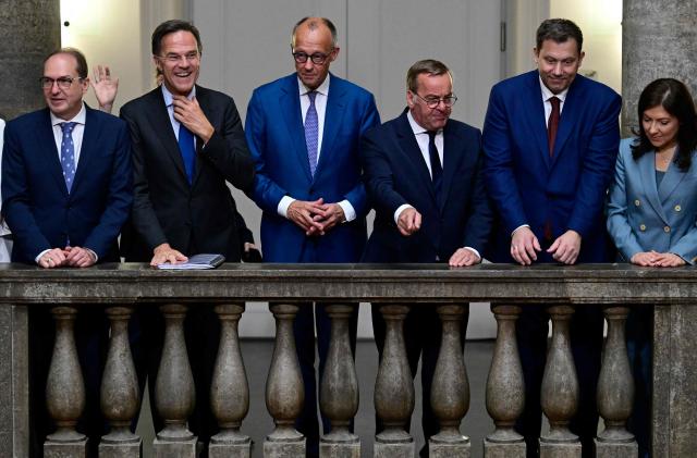 (L-R) German Interior Minister Alexander Dobrindt, NATO Secretary General Mark Rutte, German Chancellor Friedrich Merz, German Defence Minister Boris Pistorius, German Finance Minister and Vice Chancellor Lars Klingbeil and German Economy and Energy Minister Katherina Reiche pose for a group photo prior to a weekly meeting of the German cabinet at the Defence Ministry in Berlin, Germany, on July 1, 2026. (Photo by John MACDOUGALL / AFP)