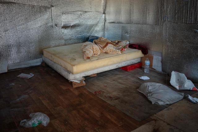 This photograph shows a makeshift bedroom after the evacuation and clearance operation of the Stains' shantytown, North of Paris, on July 1, 2026. (Photo by Dimitar DILKOFF / AFP)