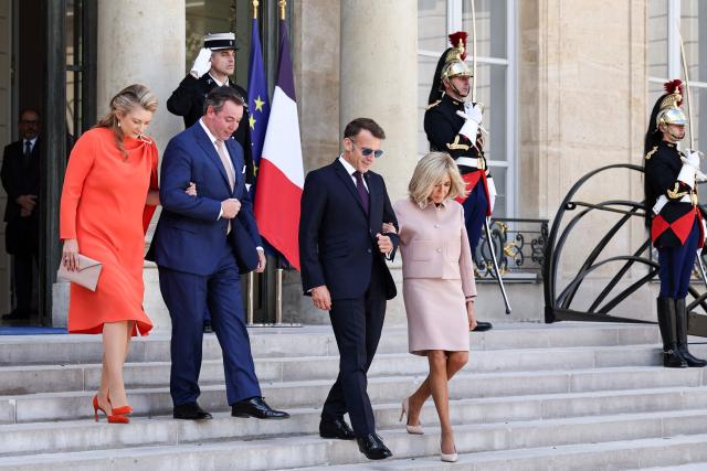 (From L) Luxembourg's Grand Duchess Stephanie, Luxembourg's Grand Duke Guillaume, France's President Emmanuel Macron and his wife Brigitte Macron leave after a meeting at the Elysee Presidential Palace in Paris on July 1, 2026. (Photo by SIMON WOHLFAHRT / AFP)
