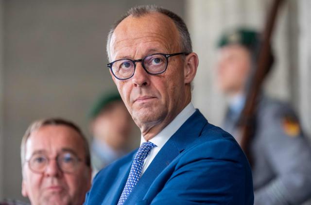 German Chancellor Friedrich Merz (R) and German Defence Minister Boris Pistorius wait for the NATO Secretary General, expected to attend a weekly meeting of the German cabinet at the Defence Ministry in Berlin, Germany, on July 1, 2026. (Photo by Michael Kappeler / POOL / AFP)