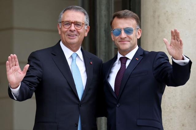 France's President Emmanuel Macron welcomes Portugal's President Antonio Jose Seguro upon his arrival at the Elysee Presidential Palace in Paris on July 1, 2026 ahead of their bilateral meeting. (Photo by SIMON WOHLFAHRT / AFP)