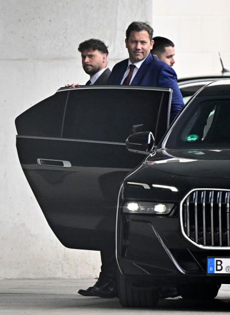 German Finance Minister and Vice Chancellor Lars Klingbeil (C) from Germany's social democratic SPD party arrives on July 1, 2026 at the Chancellery in Berlin, Germany, to attend a meeting with the government's coalition committee on a series of reforms. (Photo by Tobias SCHWARZ / AFP)