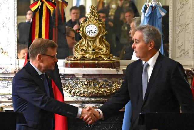 Germany's Minister of Foreign Affairs Johann Wadephul (L) and Argentina's Foreign Minister Pablo Quirno (R) shake hands after a press conference at the San Martin Palace in Buenos Aires on July 1, 2026. (Photo by Luis ROBAYO / AFP)