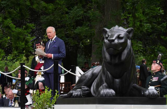 Britain's King Charles III, in his role as Colonel-in-Chief of the Royal Regiment of Scotland, speaks after unveiling a statue of a lion, by Scottish sculptor Kenny Hunter, to mark the Regiment's 20th anniversary, at West Princes Street Gardens in Edinburgh, Scotland, on July 1, 2026. (Photo by Aaron Chown / POOL / AFP)