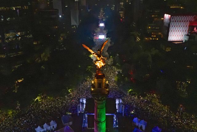 Aerial view of Mexican football fans celebrating Mexico’s victory over Ecuador after the FIFA World Cup 2026 match at the Angel of Independence monument in Mexico City on June 30, 2026. At least three people died during the mass celebrations in Mexico City to mark the national football team’s progress in the 2026 World Cup, the local government reported. (Photo by Claudia Rosel / AFP)