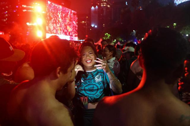 Mexican football fans celebrate Mexico’s victory over Ecuador after the FIFA World Cup 2026 match at the Angel of Independence monument in Mexico City on June 30, 2026. At least three people died during the mass celebrations in Mexico City to mark the national football team’s progress in the 2026 World Cup, the local government reported. (Photo by Claudia Rosel / AFP)