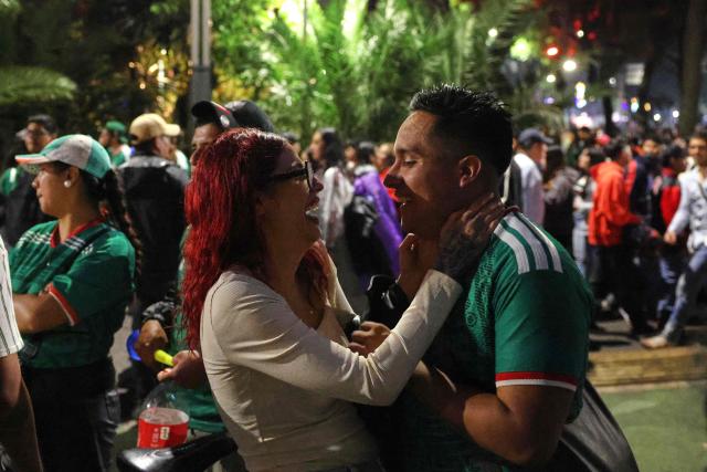 Mexican football fans celebrate Mexico’s victory over Ecuador after the FIFA World Cup 2026 match at the Angel of Independence monument in Mexico City on June 30, 2026. At least three people died during the mass celebrations in Mexico City to mark the national football team’s progress in the 2026 World Cup, the local government reported. (Photo by Claudia Rosel / AFP)