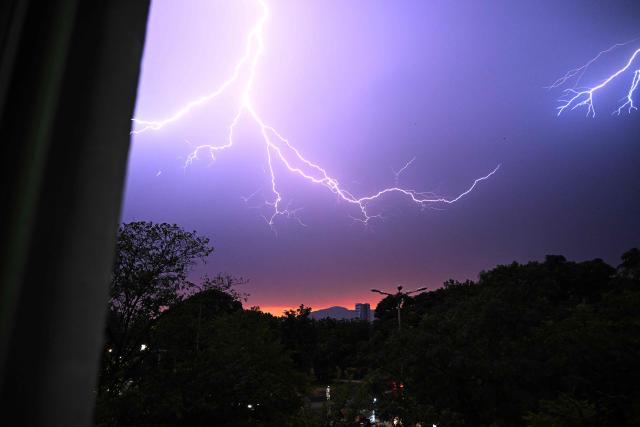 Lightning strikes during rain and thunderstorm in Islamabad on July 1, 2026. (Photo by Aamir QURESHI / AFP)