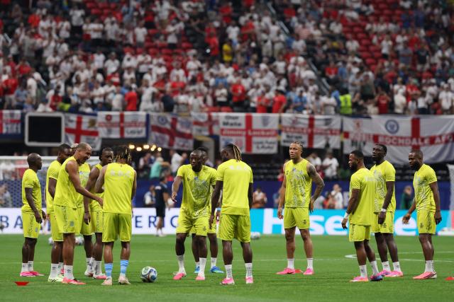 Congo DR's players take part in the warm-up ahead of the 2026 World Cup round of 32 match football between England and the Democratic Republic of Congo at the Atlanta Stadium in Atlanta on July 1, 2026.  (Photo by Odd ANDERSEN / AFP)