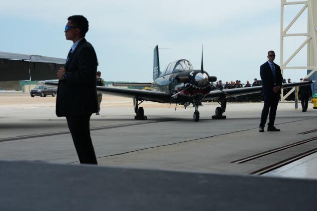 Members of the US Secret Service stand watch before Vice President JD Vance speaks during an event marking 250 years of the American military at Naval Air Station Oceana in Virginia Beach, Virginia, on July 1, 2026. (Photo by Ken Cedeno / POOL / AFP)