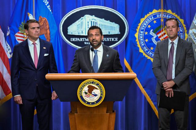 FBI Director Kash Patel (C), alongside Acting US Attorney General Todd Blanche (L) and US Attorney for the Northern District of Nevada (R), speaks during a news conference about Tren de Aragua developments, at the US Department of Justice headquarters in Washington, DC, on July 1, 2026. (Photo by Alex WROBLEWSKI / AFP)