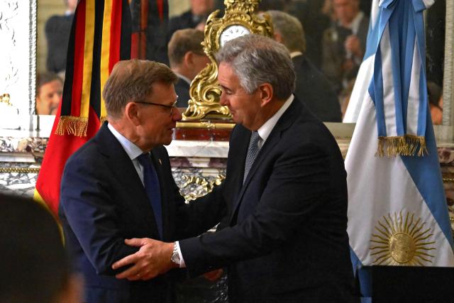 Germany's Minister of Foreign Affairs Johann Wadephul (R) and Argentina's Foreign Minister Pablo Quirno (R) greet at end a press conference at the San Martin Palace in Buenos Aires on July 1, 2026. (Photo by Luis ROBAYO / AFP)