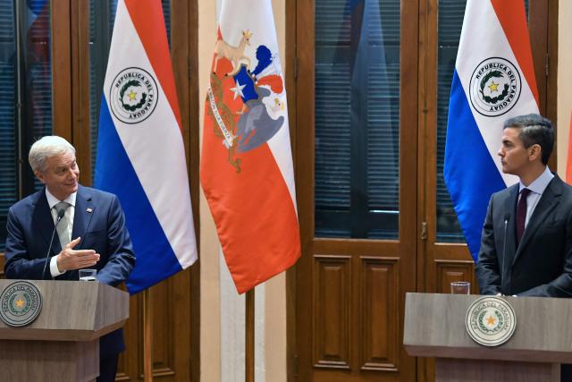 Chile's President Jose Antonio Kast (L) speaks as Paraguay's President Santiago Pena (R) listens during a joint press conference in Asuncion on July 1, 2026. (Photo by DANIEL DUARTE / AFP)