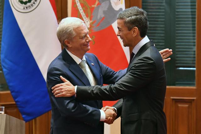 Chile's President Jose Antonio Kast (L) and Paraguay's President Santiago Pena (R) shake hands after a joint press conference in Asuncion on July 1, 2026. (Photo by DANIEL DUARTE / AFP)
